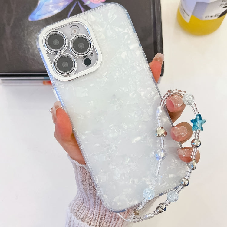 For iPhone 16 Plating Glitter Texture Chain Wristband TPU Phone Case with Lens Film(White Shell Pattern) - iPhone 16 Cases by buy2fix | Online Shopping UK | buy2fix